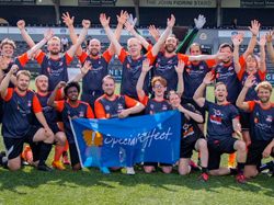 Football team with charity banner