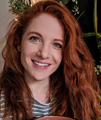 Smiling young woman with long hair